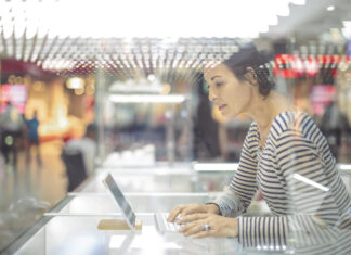 Businesswoman is working on her digital tablet